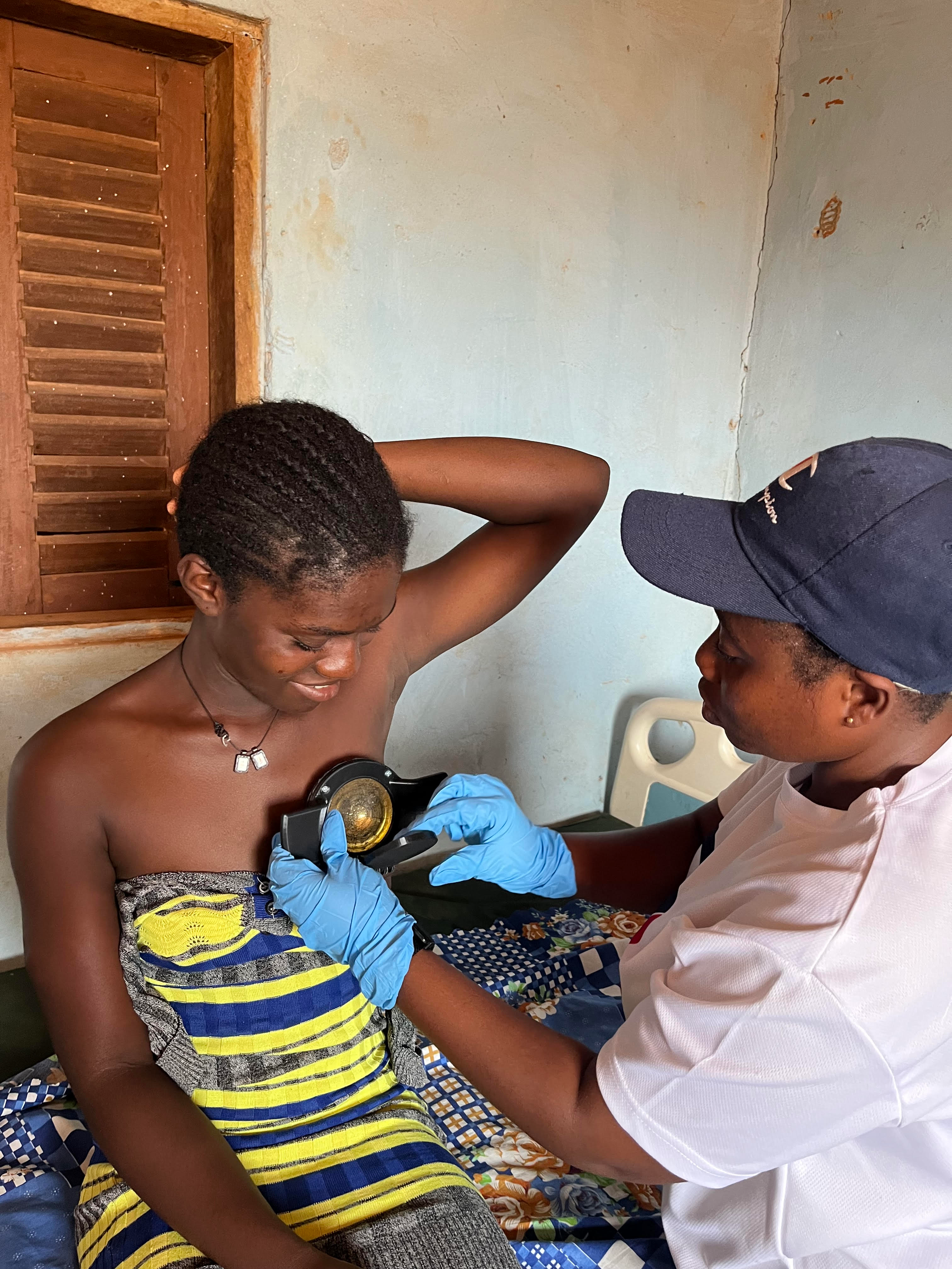 MiraScope® device being used for breast examination in Ghana healthcare setting
